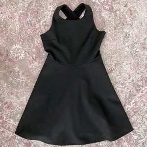 Black A-Line Mini Dress with pockets and open back